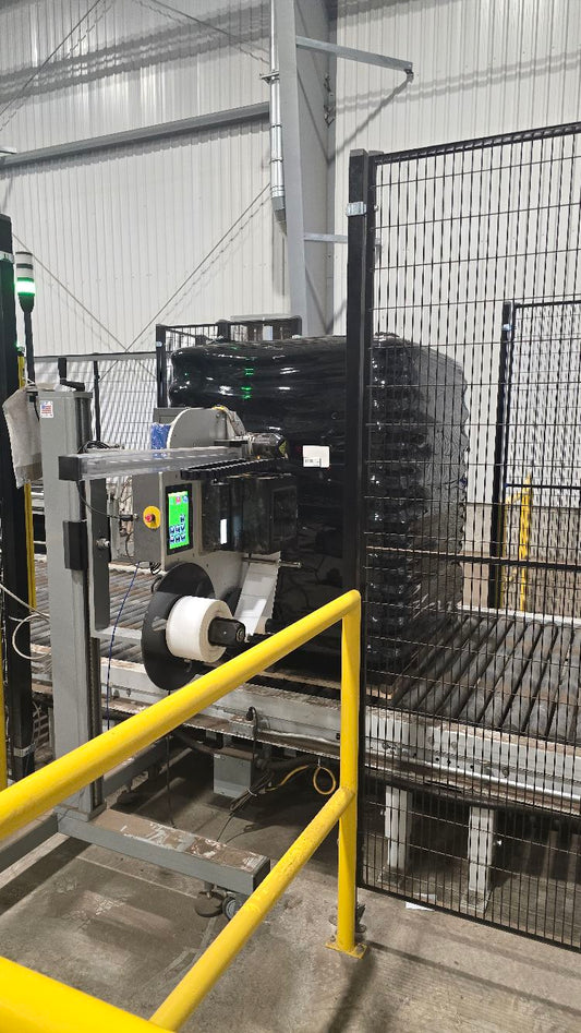 Automatic printer-applicator for labeling pallets and industrial products